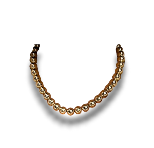 CHOKER CUENCAS DORADAS